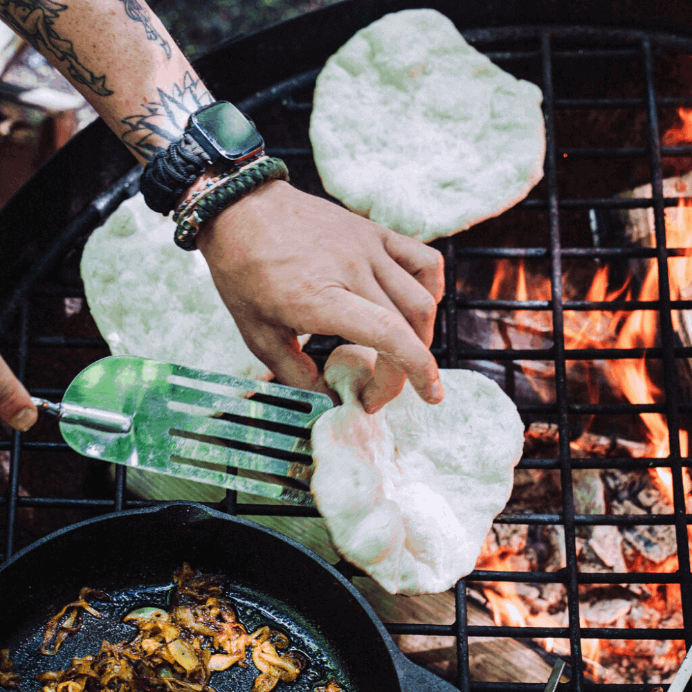 cooking flatbreads over an open fire